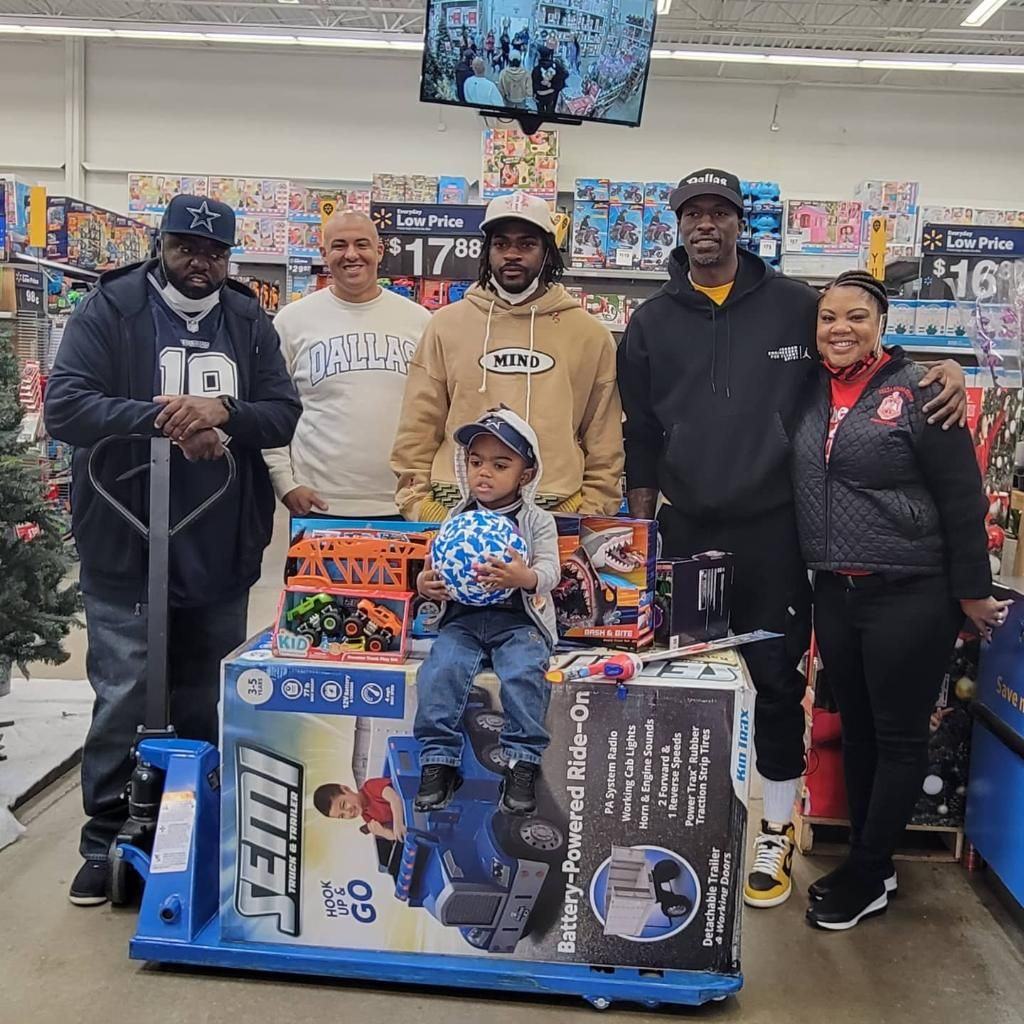 Gathering gifts for the giveaway at Walmart